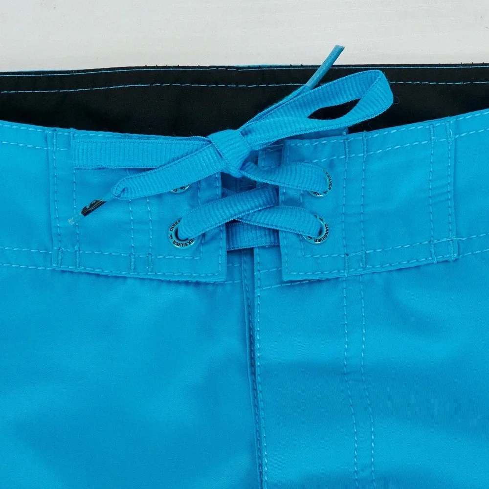 Quiksilver Lightweight Board Shorts Men's 32 Cyan Blue two Cargo Pockets Lace Up